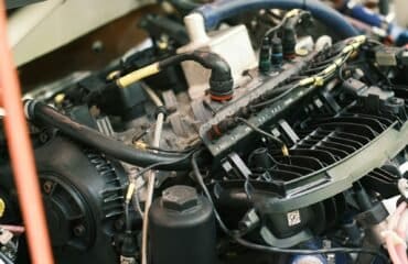 the engine compartment of a car with the hood open